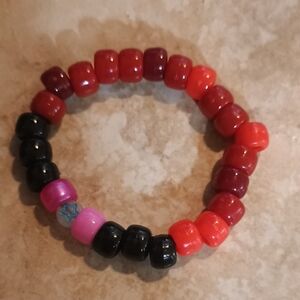 Red,black,and Pink Kandi Single With Star Bead.